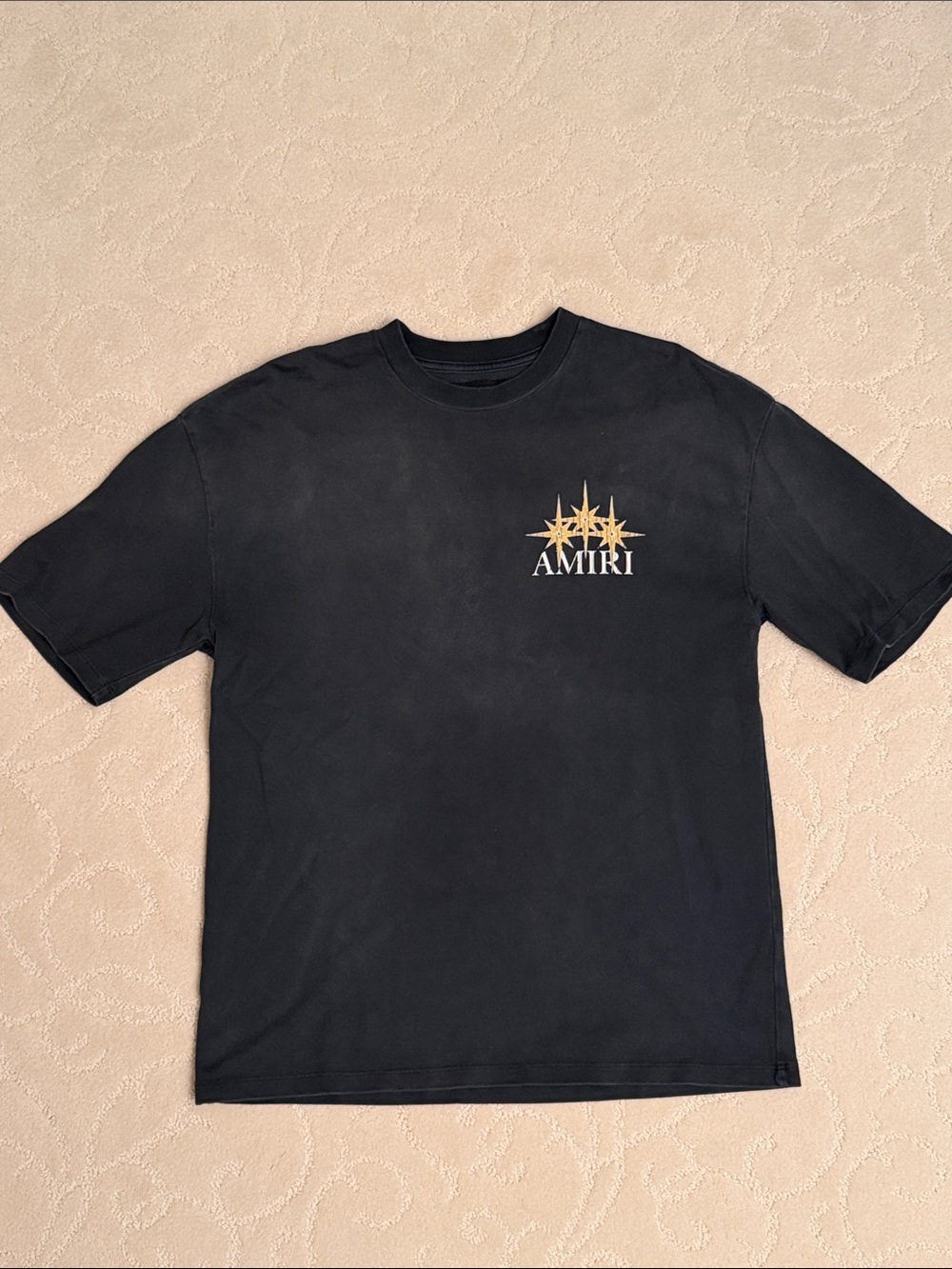AMIRI Black Tee with Gold Starburst Logo